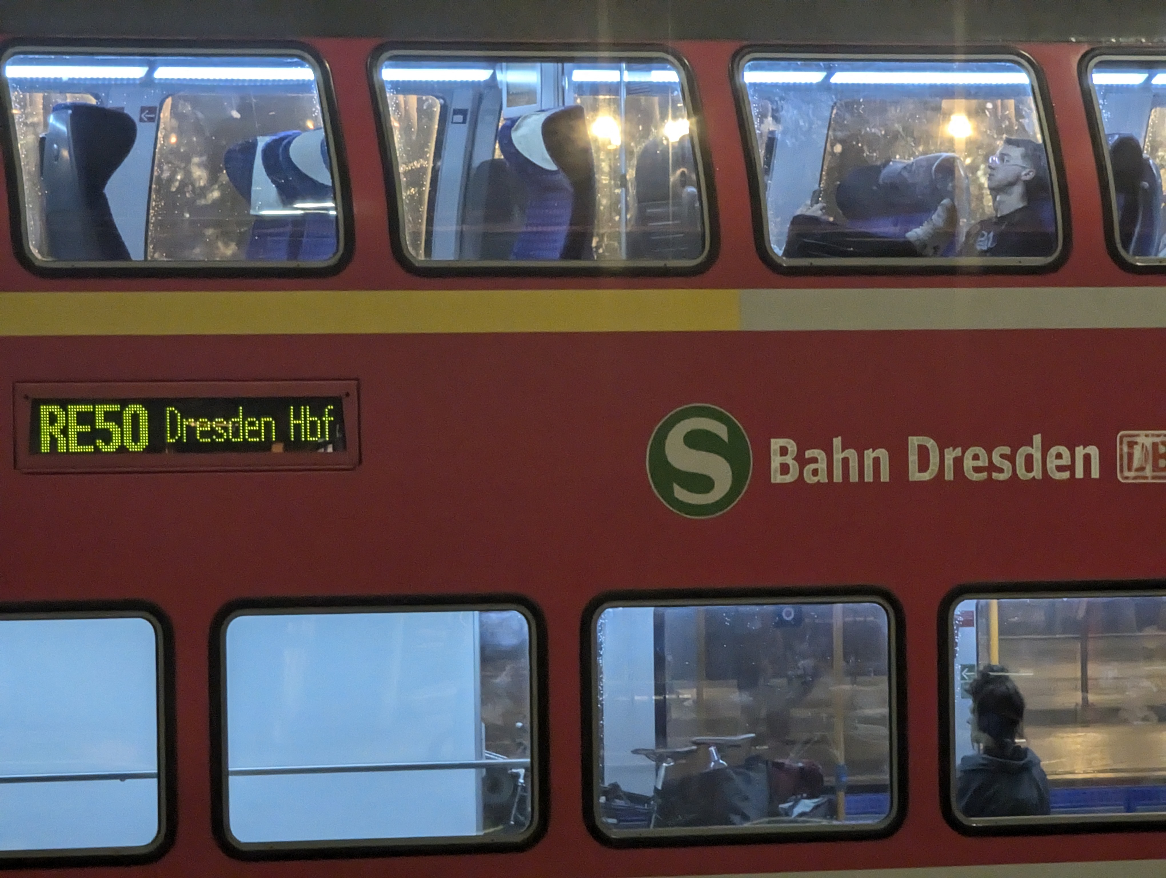 A photo of a S-Bahn Dresden double-decker carriage, running as RE 50 to Dresden Hbf.