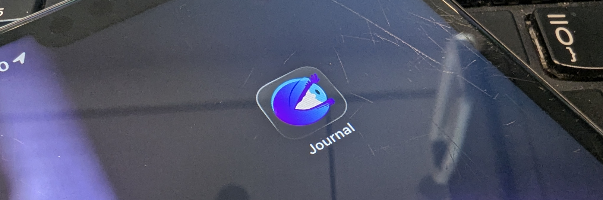 A photo of my iPhone's screen showing the PsychonautWiki Journal app on a separate home page.